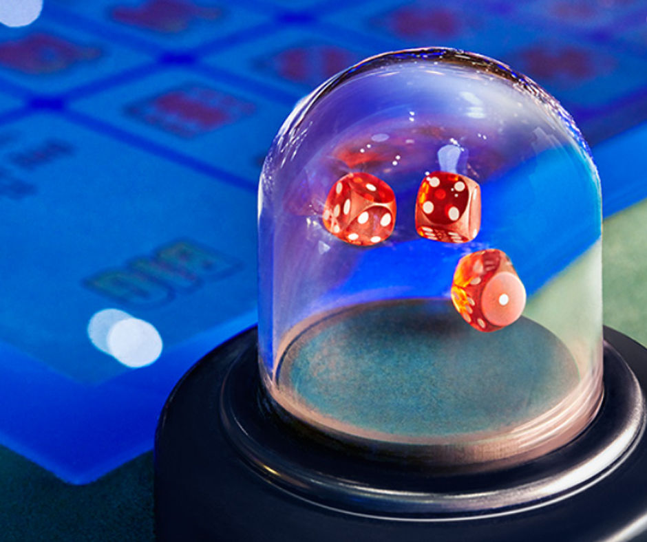 red dice inside a globe